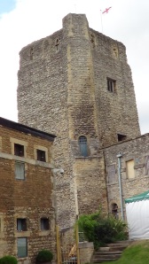 Castle tower incorporated into prison buildings